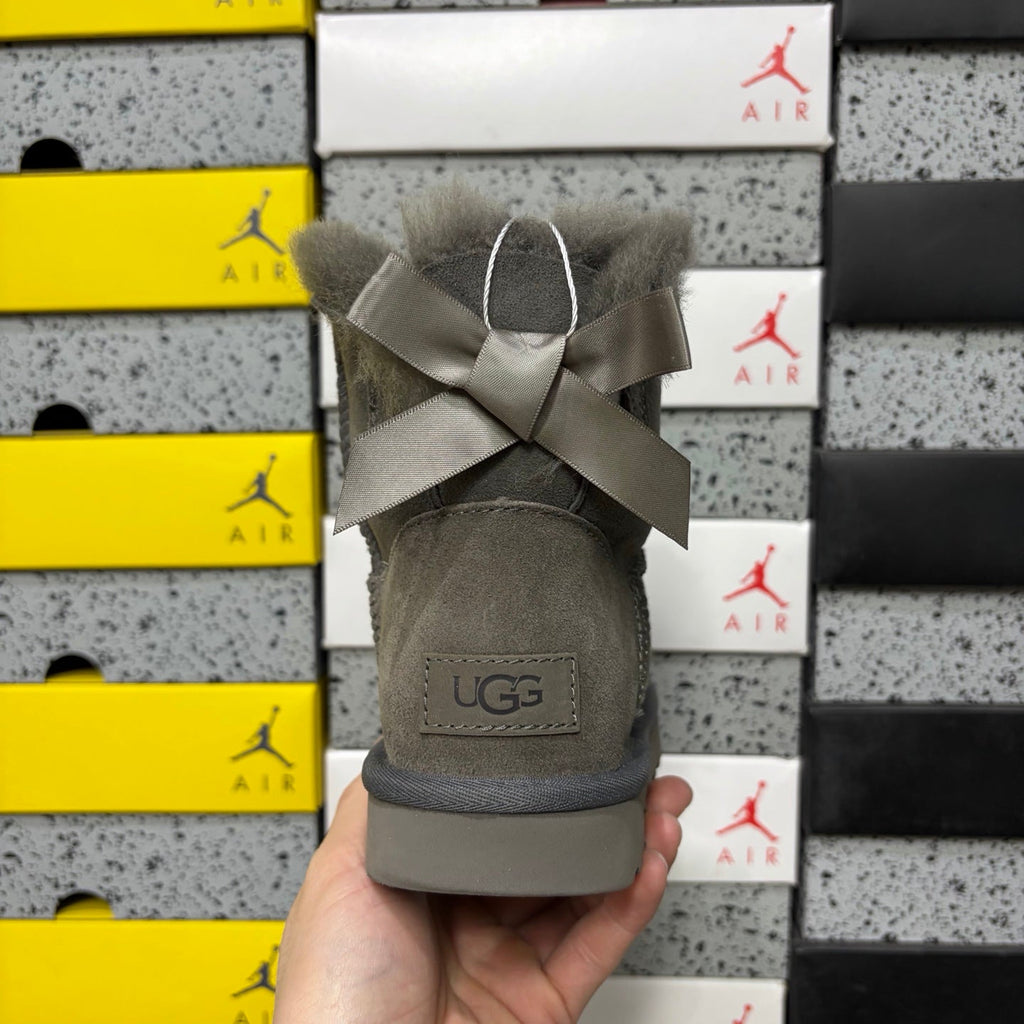 UGG Mini Bailey Bow Ankle Boot – Suede Boot with Tonal Grey Shearling Lining, Grey Satin Bow & Grey Lug Sole in Grey